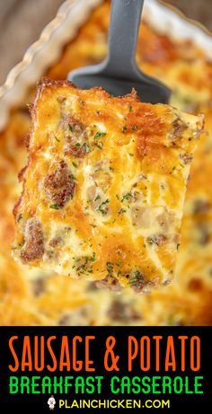 sausage and potato breakfast casserole in a white dish with a serving spatula