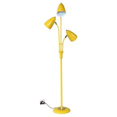 a yellow floor lamp with three lamps on it