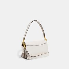 A modern take on an archival 1970s Coach design our structured Tabby shoulder bag is crafted of polished pebble leather. Finished with our Signature hardware for an iconic touch the compact 26 features two detachable straps to carry by hand style as a short shoulder bag or wear crossbody. | Coach Tabby Shoulder Bag 26 - Women's - Brass/chalk Coach Tabby Shoulder Bag, Tabby Shoulder Bag 26, Tabby Shoulder Bag, Crossbody Coach, Coach Tabby, Hand Style, Polished Pebble, Signature Hardware, Pebbled Leather