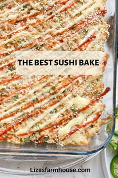 the best sushi bake is in a glass dish with cucumbers around it