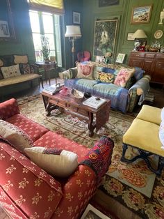 a living room filled with lots of furniture