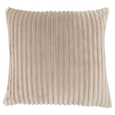 a cream colored pillow with pleated, ribbed design on the front and sides