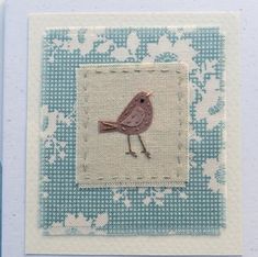 a small card with a bird on it