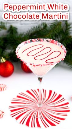 peppermint white chocolate martini with candy canes on the rim