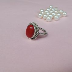 Handmade Red Coral bohemian ring, you can wear this ring as a party wear ring .. Title - Red Coral silver ring    Stone color - Red Coral  Stone shape - Oval Material - Sterling silver 925 Note - THIS CORAL STONE IS NOT NATURAL, IT IS LAB CREATED STONE, IF YOU WANT THE REAL CORAL STONE RING YOU CAN CONTACT US WE WILL PROVIDE YOU THE BEST PRICE FOR THE REAL CORAL STONE... we are giving you the best quality rings at the best price. contact us for more quantity Red Gemstone Toe Ring, Red Toe Ring As Gift, Bohemian Ruby Ring For Gift, Adjustable Red Gemstone Rings, Handmade Red Toe Ring, Red Minimalist Jewelry For Wedding, Minimalist Red Jewelry For Wedding, Bohemian Crystal Wedding Ring, Adjustable Red Crystal Promise Ring