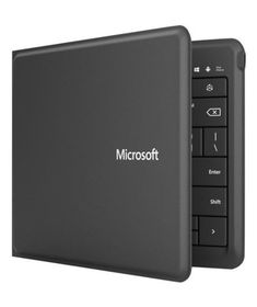 an external hard drive attached to the back of a laptop computer with microsoft logo on it