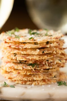 a stack of food sitting on top of a white plate