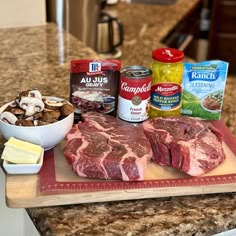 some meat and other ingredients on a cutting board