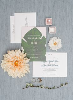 the wedding stationery is laid out and ready to be used