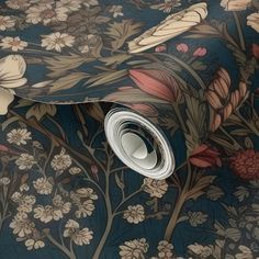 an image of a wallpaper with flowers and leaves on the background that looks like it is going to fall