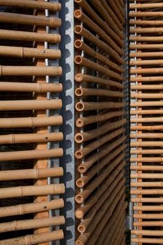 several different types of bamboo blinds are lined up on the wall in front of each other