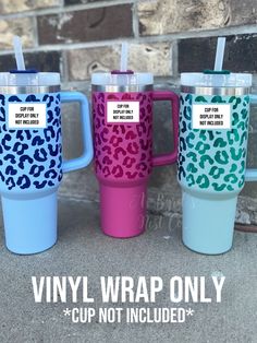 three different colored leopard print coffee mugs with straw in each cup and the words vinyl wrap only on them