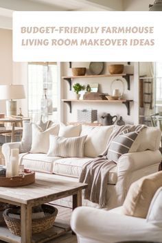 a living room filled with white furniture and lots of pillows on top of it's couch