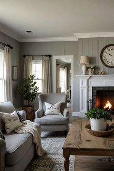 a living room filled with furniture and a fire place in front of a clock on the wall