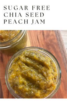 two jars filled with sugar free chia seed peach jam on top of a wooden table