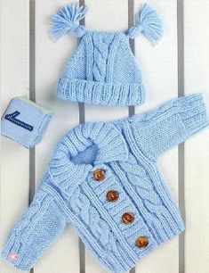 a blue knitted sweater and hat with buttons