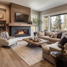 a living room filled with furniture and a fire place in the middle of the room