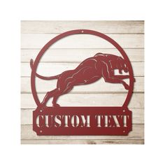 a red metal sign that says custom text with a running dog on the front and bottom