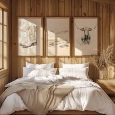 a bed with white sheets and pillows in a room next to wooden paneled walls