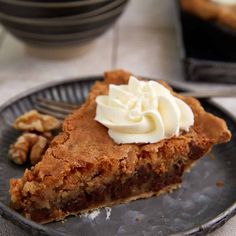 a slice of pie with whipped cream on top