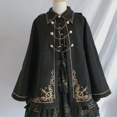 Get ready in style with this Steampunk woolen cloak. Crafted with precision and attention to detail, this Steampunk cloak is made from high-quality woolen fabric, ensuring warmth and comfort during those chilly Steampunk adventures. The classic Steampunk design and intricate details, such as antique buttons and ornate trims, add a touch of Victorian charm to your outfit. Size guide: Luxury Steampunk Women's Outerwear, Victorian Coats & Jackets, Luxury Historical Outerwear With Historical Design, Dark Academic Accessories, Suits Steampunk, Cloak Outfit, Victorian Coat, Japanese Harajuku, Victorian Clothing