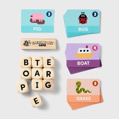 wooden blocks with words and pictures on them, including the word bite boar pig snake