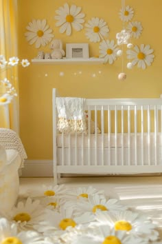 a white crib in a yellow room with daisies on the floor and wall