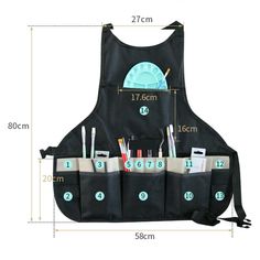 an apron that has compartments for pens and pencils in it, with measurements on the side