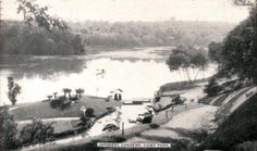 an old black and white photo of a river