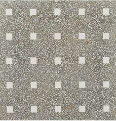 an abstract pattern made up of squares and dots in grey, white and brown colors