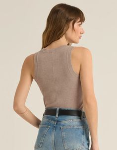 One of Z Supply's most popular Essential tanks, made of their softly textured feather rib fabric, is a must-have whether worn on its own or as a fitted layer. We love this basic bra-friendly tank tucked or untucked. Fitted Premium Feather Rib: 95% Cotton, 5% Spandex Scoop neck Sleeveless Machine Wash Cold, Tumble Dry Low Rib Fabric, Blouse Pants, Ribbed Tank, Short Jacket, Ribbed Fabric, Jeans Dress, Top Tee, Sweater Jacket, Short Pants