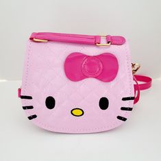 Hello Kitty Little Girl's Bag. -Crossbody Bag With Detachable Strap. -Bag: Size: 6" 3/4 6", 2" Wide -Belt: Approx. 33" Length, 10" Extender -Hello Kitty Logo On The Back. - 4 To 10 Years Old Colors Available: -Light Pink -Gold New Offers Accepted Waterproof Messenger Bag, Hello Kitty Handbags, Hello Kitty Purse, Anime Bag, Waterproof Crossbody Bag, Kids Totes, Charmmy Kitty, Hello Kitty Bag, Children Cartoon