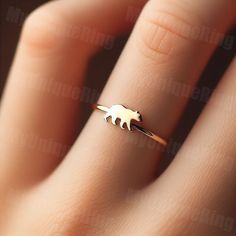 *Free engravings up to 20 characters* 🐻 Step into the wilderness with our Gold Women's Walking Bear Ring! 🌿 👑 Make a statement with this majestic piece, meticulously crafted with precision and passion. Designed for the modern woman who admires the strength and grace of bears. 🌟 🌟 Handcrafted from high-quality 10k gold, this ring features a detailed depiction of a walking bear, capturing the power and beauty of these magnificent creatures in motion. 💫 💖 The bear symbolizes strength, courage, and protection, making this ring a perfect accessory for those who seek resilience and embrace their inner fortitude. 🌸 🎁 Whether it's a treat for yourself or a cherished gift for someone special, this women's walking bear ring is sure to inspire and become a cherished addition to any jewelry c Bear Ring Jewelry, Bear Ring, Bear Jewelry, Ring Bear, Gold Rings Fashion, Jewelry Simple, Rings Fashion, Ring Minimalist, Ring Dainty