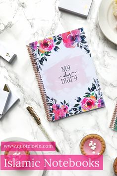 a notebook with the words, my daily diary on it next to some cookies and cupcakes