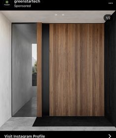 a wooden door in the middle of a room