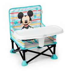 a mickey mouse highchair that is on display