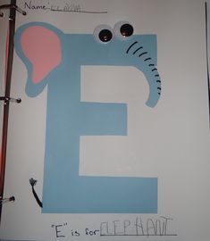 a close up of a book with an e on it