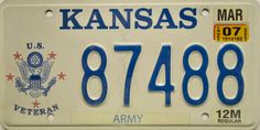 a license plate with the words kansas and an eagle on it's back side