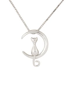 This lovely necklace features a cat gazing serenely from the moon. Give off an air of mystery, nostalgia, or romance with this necklace. The silver plating will allow the necklace to pair well with any outfit. A sweet and simplistic look, and a must have jewelry piece to add to your collection. The perfect gift for cat lovers. A sweet and nostalgic necklace that can pair with any outfit. The perfect gift for loved ones, friends, and cat lovers. Plated in 925 sterling silver for a polished look. Dimensions: Pendant 0.625L x 0.5W inches. 15.5 inch chain with 2 inch extension. Material: Sterling Silver Plating, Alloy. Dainty Silver Necklace With Cat Design, Silver Cat Design Necklace, Silver Cat Design Round Necklace, Elegant Cat Design Pendant Necklace, Elegant Pendant Necklace With Cat Design, Elegant Silver Necklace With Cat Design, Sterling Silver Cat Design Pendant Necklace, Must Have Jewelry, Cat And Moon