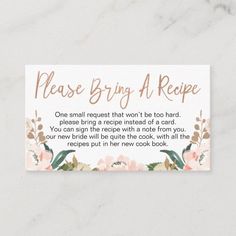 a recipe card with flowers and leaves on the front, which reads please bring a recipe