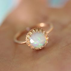 Like a little moon glowing with rainbow fire. This stunning white jelly opal dances with iridescence like you wouldnt believe. Such an elegant piece and with so much character. Perfect from day to night.  Each piece of opal has different color, its unique and charm. This listing is for one piece of opal ring only.  ~~~~~~~~~~~~~~~~~~~~~~~~~~~~~~~~~~~~~~~~~~~~~~~~~~~~~~~~~~~~~~~~~~~~~~~~~ Gem: 8mm / approx. 1.60ct / genuine translucent opal / fair trade Metal: recycled 14k solid... Gold Opal Rings, Three Peas In A Pod, Recycled Gold Ring, Jelly Opal, Color Rings, Gold Color Ring, Pink Tourmaline Ring, Rainbow Fire, Opal Ring Gold