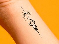 a woman's arm with the word hope written in cursive writing on it