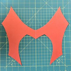 the paper is cut out and ready to be used for making an origami heart