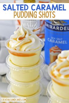 salted caramel pudding shots with whipped cream in the middle and on top, sitting next to other desserts