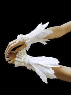 These feather cuffs are made from swan feathers and lace. They can be closed with satin ribbons and adjustable to all size. The size is 5.5inch wrist circumference (fully closed) The are 9-13 inch wide (feathers, lace). Handmade in U S A . Fantasy Accessories, Feather Cuffs, Feather Cuff, Bridal Cuff, 사진 촬영 포즈, White Swan, Fantasias Halloween, Costume Hats, Drawing Clothes