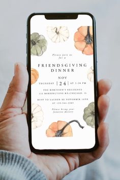 a person holding up a phone with the text friends giving dinner now on it's screen