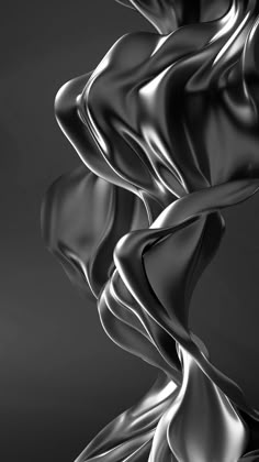 an abstract black and white photo with wavy lines