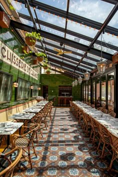 the inside of a restaurant with tables and chairs set up for an outside dining area