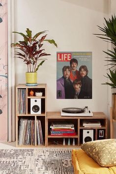 a living room filled with furniture and plants