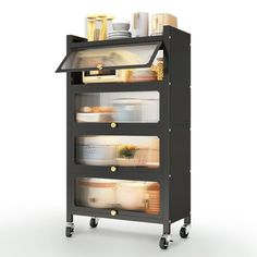 an image of a kitchen cart with food in the back and shelves full of dishes